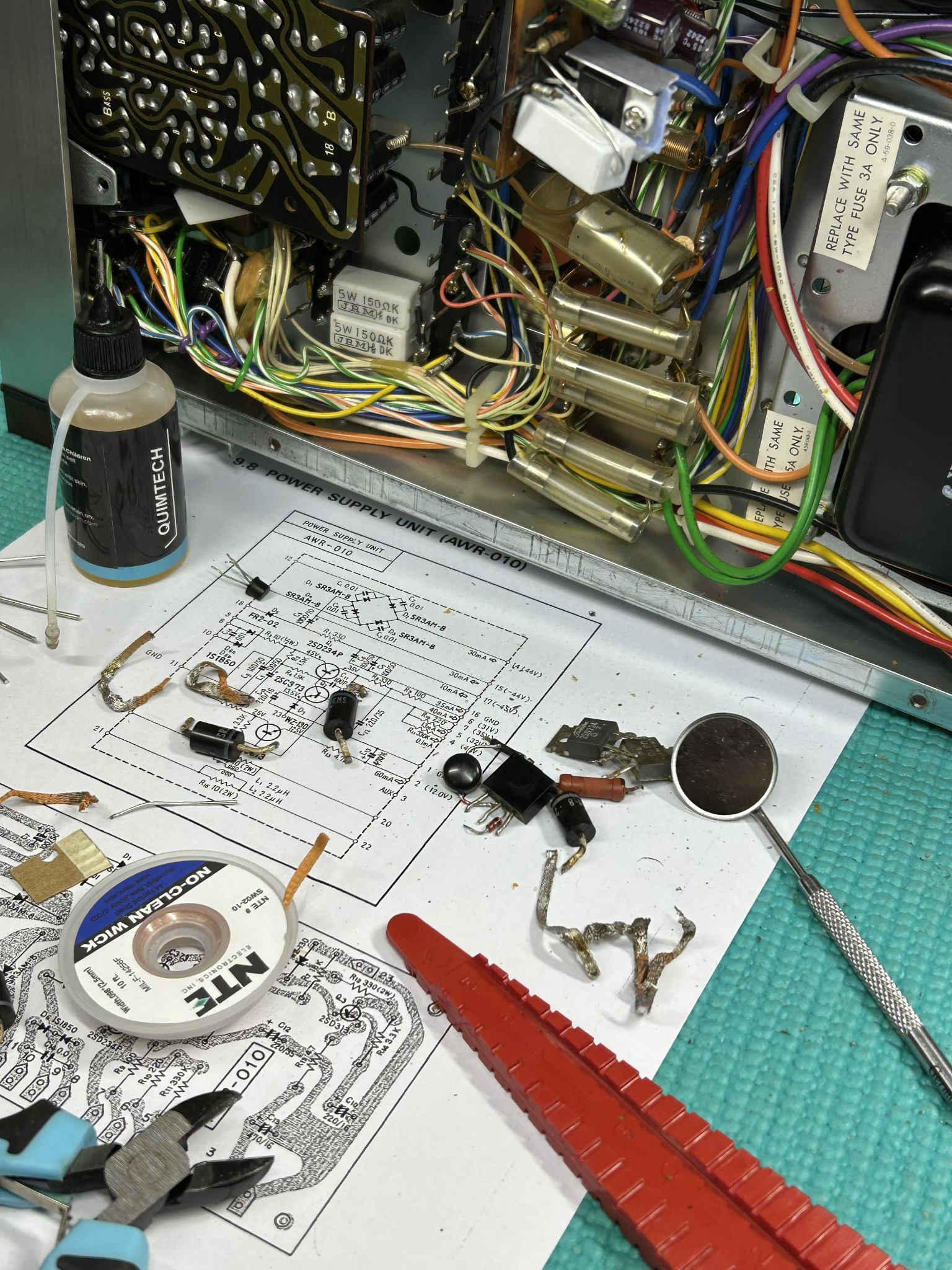 Close-up of rebuilt Pioneer SX-828 power-supply components and upgraded parts